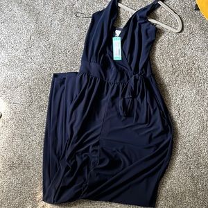Sleeveless jumpsuit, size LG. Never been worn. Tags attached.